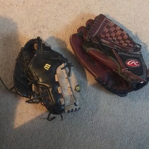 Two used baseball gloves